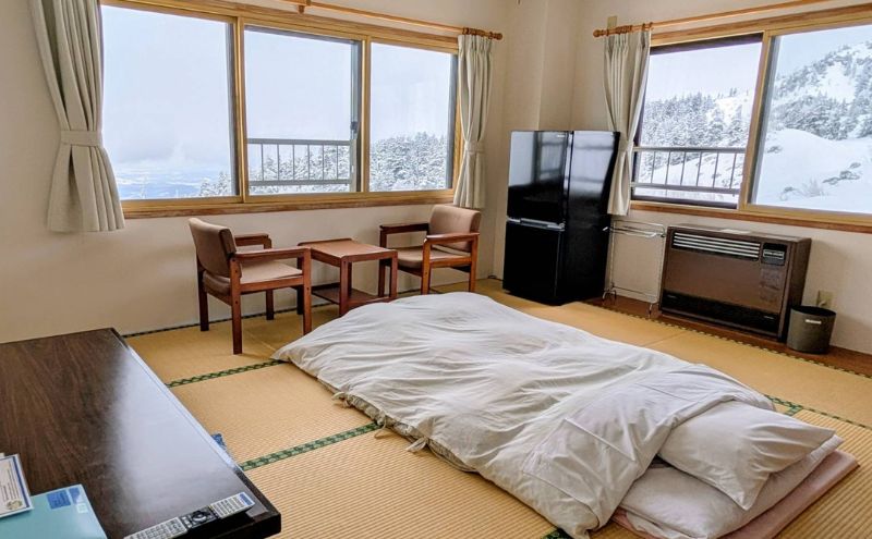湯元凌雲閣 【 1泊朝食付 】 ペア 宿泊券 ホテル 旅館 旅行券 北海道 上富良野町 十勝岳